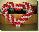 Kalp bi�iminde balon buket tanzimi onlarca balon